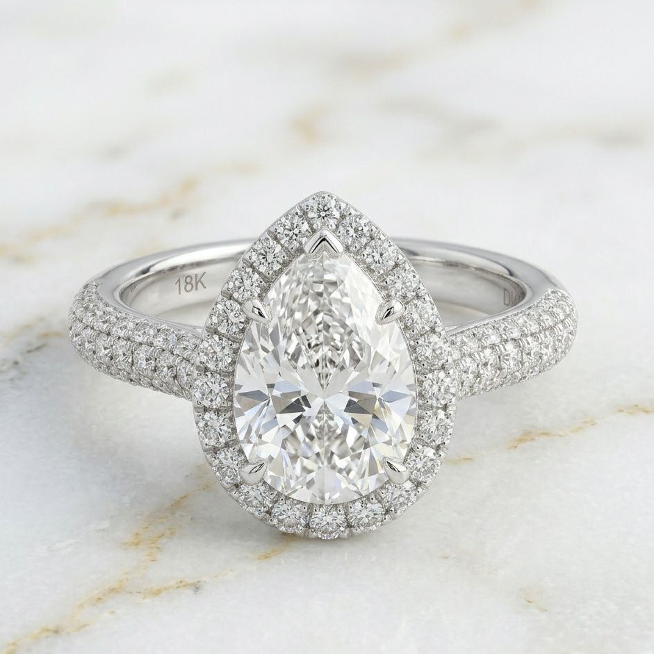 Bague halo pavée poire