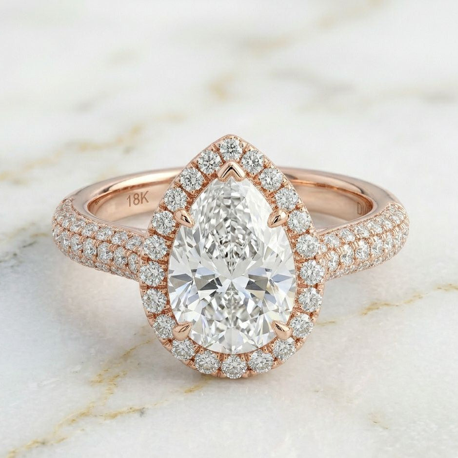 Bague halo pavée poire