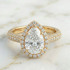 Bague halo pavée poire
